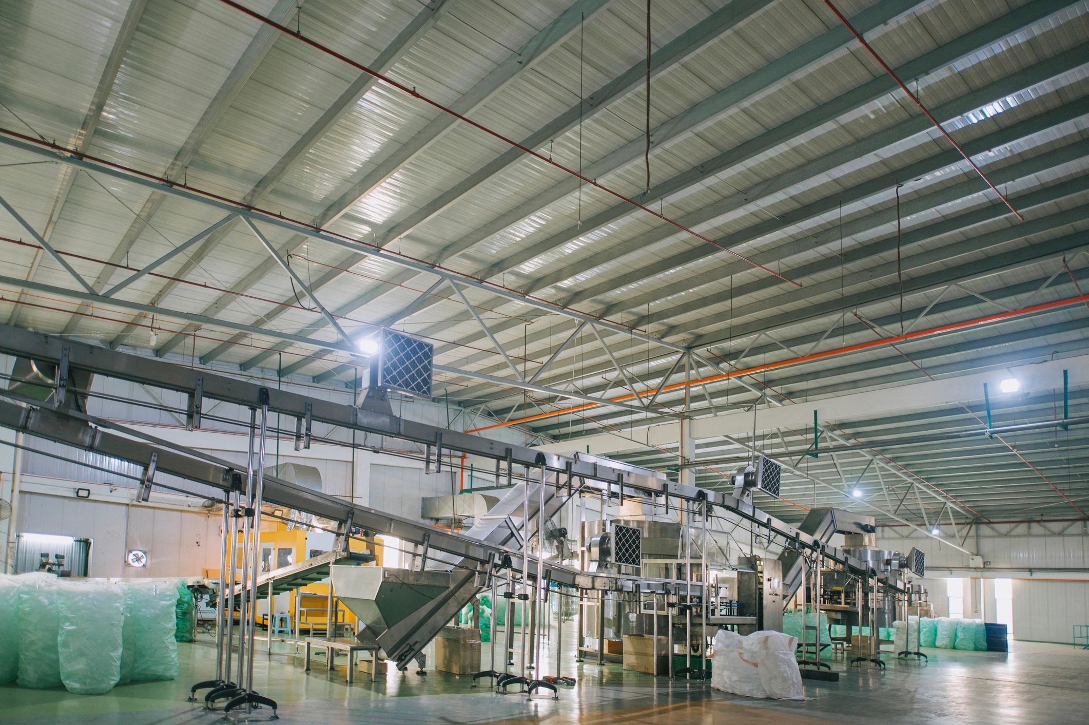 Industrial production line representing essential operating businesses