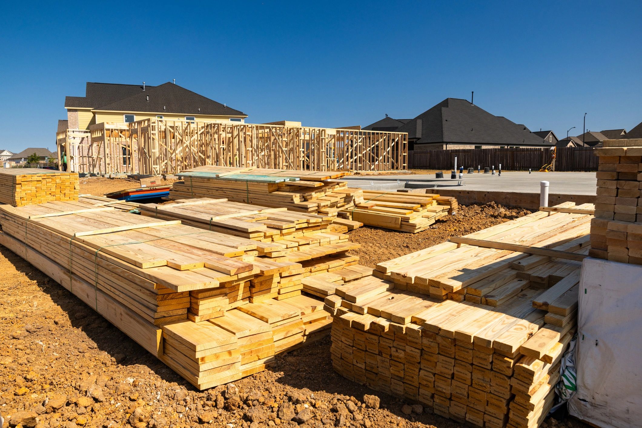Stacked lumber and building materials